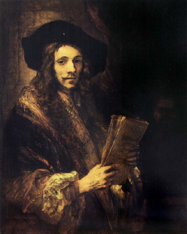  Portrait of a young madn holding a book